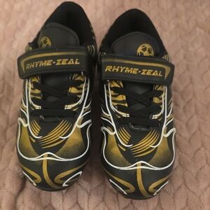 Kids Black and Gold Cleats